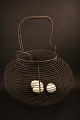 Large old French egg basket in fil de fer with a really fine patina.H:40cm. Dia.:32cm.