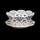 A Royal Copenhagen blue fluted full lace fruit bowl. #1061. H: 10,5cm. D bowl: 23cm