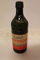 Gammel original flaske med etiketten "Blankit Gulvpolish - Voksbonemiddel"Fra "S. Dyrup & Co. Aktieselskab København"Vi har et stort udvalg af gamle købmandsvarer