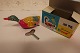 For the collectors:"Swimming Duck" made of metalThe duck can be winded, - it works very well and it is as good as newPlease note the long legs of the duckThe original box as well as the original key come with the itemL. about 8cm