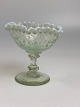 Old sugar bowl on foot; clear glass  with white ruffle edge