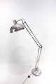 Gulvlampe i rustfrit stål af dansk design fra 1980erne.5000m2 udstilling