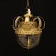 Sladrekompas med forgyldt krone og kardansk ophæng. Kuppel med indskriften "Das Schiff die Junge Marianne 1803. Comdüre Andreas Daal" samt afbildning af skibet førende Dannebrog med Christian C7s kronede monogram. Hidrørende fra Rømø. H: 26cm