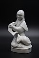 Royal Copenhagen porcelænsfigur af "Fisker med sin fangst" i Blanc de chine af Georg Thylstrup. H:18cm.