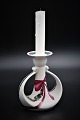 Royal Copenhagen "Jingle Bells" julelysestage i porcelæn med julemotiv.Højde:13cm.