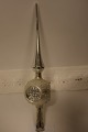 An old glass top for the Christmas tree made of glassAn old top with reflector, made of glass, silver colour, with details, for the use by the Christmas treeIn a good condition