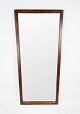 Spejl med smal ramme i palisander af dansk design fra 1960erne.