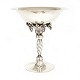 A Georg Jensen Art Noveau Sterlingsilver grape tazza. Made 1918-30. #264. H: 27cm. W: 1.125gr