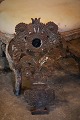 Decorative, old French metal wall decoration with floral motif and small mirror. H:53,5cm. W:31cm.