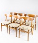 Sæt af seks spisestuestole i teak og polstret med mønstret stof af dansk design fremstillet af Farstrup Møbler i 1960erne. 5000m2 udstilling.