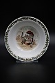 Royal Copenhagen Christmas porridge bowl in porcelain with Christmas motif. RC# 2/14198. H:5cm. Dia.:16cm.SOLD !