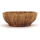 A stoneware bowl by Bode Willumsen, Denmark, 1895-1987. Signed Bode Willumsen. H: 9cm. D: 23cm