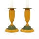 A pair of green and yellow decorated pair of candle sticks. Denmark circa 1840-50. H: 19cm