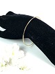 Massiv armring af 14 karat guld. 