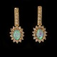 Pair of 14kt gold earrings each with an oval opal and 19 diamonds of ca. 0,015ct. H: 24mm. W: 10mm