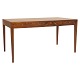 Rosewood veneered writing table by Severin Hansen, Denmark. Manufactured by Haslev Møbelsnedkeri. Nice condition. H: 73cm. Plate: 75x143cm