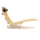 Poul Kjærholm PK 24 chaiselong / Hammock chair med peddigrør og stel i rustfrit stål. Nakkepude i sort læder. Produceret af Fritz Hansen. Design fra 1965. H: 88cm. L: 150cm. B: 69cm
