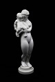 Kai Nielsen (1882-1924) "Woman with child" in Blanc de Chine (white porcelain) from Bing & Grondahl. B&G#4109. 1.sort. Height: 32cm.