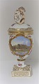 Royal Copenhagen. Porcelæns ægvase med putti. Motiv : Botanisk Have. Højde 27 cm. Produceret 1894-1900. (1 sortering)