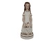Royal Copenhagen overglaze figurineHuguenot girl by Arno Malinowski