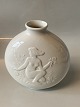 Hans Henrik Hansen #Royal Copenhagen #Blanc de Chine vasewith decoration in relief in the form of faun and naked woman.Deck # 4118,