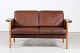 Dansk Møbeldesign2-pers. sofamørkt cognacfarvet læder