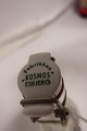 Patentflaske fra KOSMOSTeksten "KOSMOS" er præget i flaskens glas og på proppen står der med grøn skrift "Fabrikken KOSMOS, Esbjerg"I flaskens bud er præget "Mineralvand"