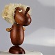 Teaktræs figur med øloplukkerOptimist
