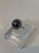 14 carat ladies ring with diamonds and a blue sapphireSize 51