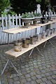 Old French, bookcase consisting of 3 wrought iron floor stands which carry 2 shelves of old floorboards....