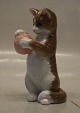 0669 RC Standing upright cat holding a ball in its paw 11.5 cm  (1249669) Royal Copenhagen