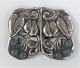 Jugend Silver belt buckle (830) with 6 green stones. Length 7 cm. Width 6 cm. Stamped 830S and IH.