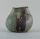 Christina Muff, dansk samtidskeramiker (f. 1971).Unique seedpod vessel made from stoneware clay, with matte blue and brown glaze.