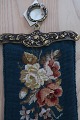 An old bell wireHandmade with petit point (very tiny cross stiches)Please note the beautiful item for the hangingL: 118B: 15cm