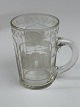 Glass and deciliter measure with engraving of the castle of Pyrmont in the town of Bad Pyrmont in Germany.
