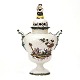 Polychrome lidded Rococo faience vase by the manufacture of Stockelsdorf, Northgermany. Signed Stff / B / AL, Stockelsdorff, director Buchwald and painter Abraham Leihammer 1772-74. H: 38cm