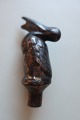 An old pourerIn a untraditionel shape - like a pelican