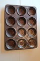 An old baking tin made of metal12 items on one tin