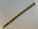 Blok Armbånd 3 RK i 14 karat GuldStemplet 585 SKR4Fra 1969-Skrivers Guldvarefabrik ApSLængde 18,5 cm caBrede 9,11 mm caTykkelse 2,72 mm ca