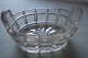 Gammelt saltkar af glasOval form med stjerne i bundenForm med "håndtag" som en "kurv"L: ca. 5,5cmI god stand