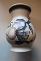 Vase fra RC (Royal Copenhagen)Stemplet: København, Danmark, 31/1H: ca. 13,5cmCa. 1940Har et lille skår i bunden (se foto), men ellers god stand