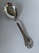 Serving spoon in SilverStamped : 3 towersProduced: 1950Length 19.8 cm
