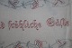 An old table cloth with embroidery, handmade130cm x 30cmText: "Im Hause das Beste sind fröhliche Gäste" In a good condition