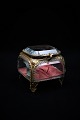 Old French jewelery box in bronze and faceted glass, silk cushion at the bottom...