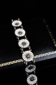 Old Marguerite / Daisy bracelet in sterling silver and white enamel from A. Michaelsen...