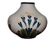 AluminiaVase med gule blomster