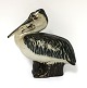 Royal Copenhagen. Stentøj. Pelikan. Model 22296. Design Jeanne Grut. Højde 13,5 cm. (1 sortering)