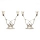Pair of Georg Jensen sterlingsilver candelabra designed by Harald Nielsen. #619. H: 16,8cm. W: 833gr