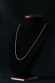 Snake chain in 14 carat gold, with simple pattern and lobster clasp. Design SW. C