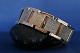 Beautiful gold bracelet in 14 carat solid gold, with box lock. Wide block with chiselling in the individual joints.